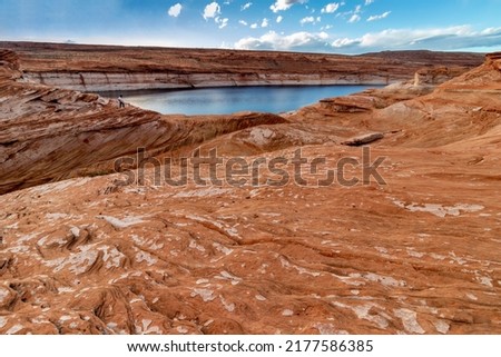 Very wide expanse of limestone rock in artistic formations on the Colorado river basin, The Chains, Page, Arizona, USA