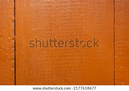 Wooden boards painted in reddish-brown paint. Backdrop Royalty-Free Stock Photo #2177618677