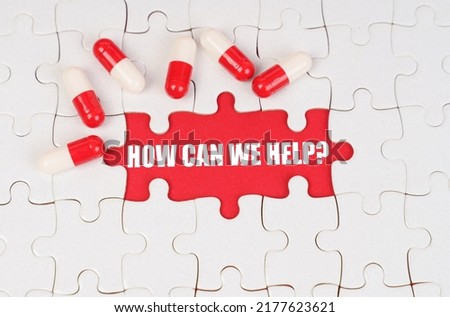 Medical concept. There are pills on the white puzzles, in the middle there is a red surface with the inscription - how can we help