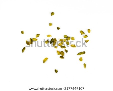 Ground, milled, crushed or granulated pistachio pile isolated on white background Royalty-Free Stock Photo #2177649107