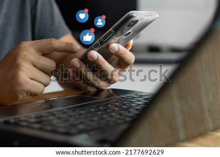 Social media and digital online concept. Man using smartphone with Social media. concept of living on vacation and playing social media. online marketing, Working From Home. technology internet.