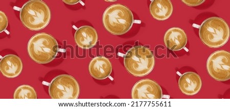 Many cups of coffee on red background. Pattern for design