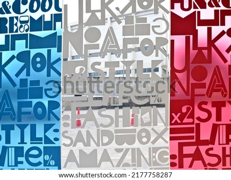 Closeup of The Letter stickers on stained glass wall abstract texture background at Thailand.