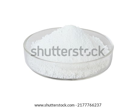 Titanium dioxide white powder in glass plate Royalty-Free Stock Photo #2177766237