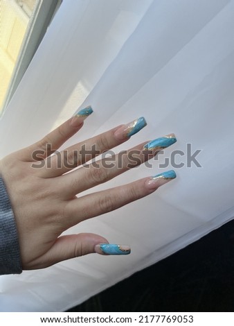 Blue marble geode long nails Royalty-Free Stock Photo #2177769053