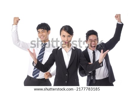 business professionals 
two man and woman in official suits with winner with open hands gesture  standing.in studio

