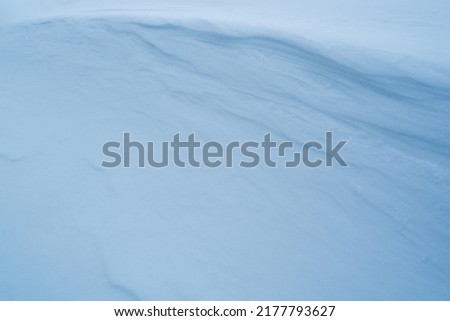 Natural Winter Christmas background with heavy snowfall, snowflakes. Winter background of snow and frost with free space for your decoration.