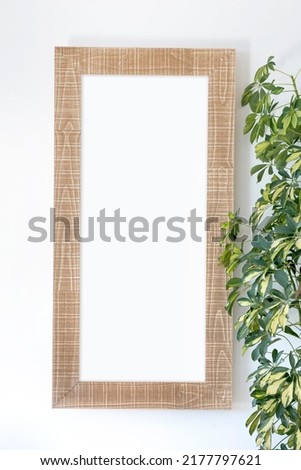 An isolated grungy brown wooden picture frame with centre isolated - stock photo