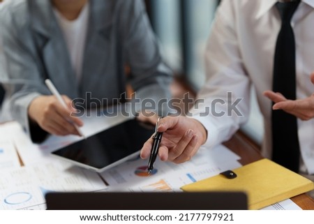 Group of businessperson analyzing financial report balance. Financial and investment concept