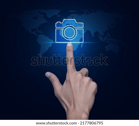 Hand pressing camera flat icon over digital world map technology style, Business camera service shop online concept, Elements of this image furnished by NASA