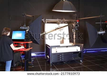 Professional photography studio setup. Motion blur Photography Studio image. Dark style designed indoor studio.