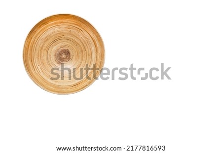 A photography of textured surface of light wooden round plate. No people picture as a design using a natural materials with structural lack worn wholes, ugly dirty cracked rustic craft stile.