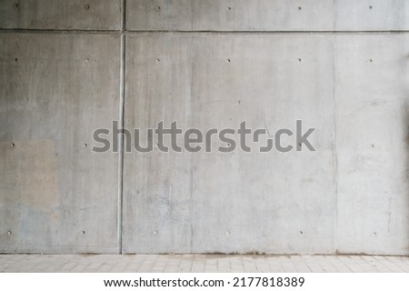 Detail of a concrete wall in the foundations of a building, with the marks of setting - stock image