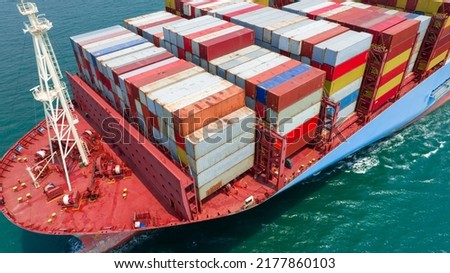 cargo ship carrying container freight and running with tug boat for export import from cargo yard port to custom ocean concept freight shipping by ship. logistics supply transportation and industry