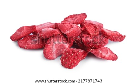 Pile of freeze dried strawberries on white background Royalty-Free Stock Photo #2177871743