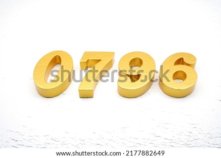    Number 0796 is made of gold painted teak, 1 cm thick, laid on a white painted aerated brick floor, visualized in 3D.                                   