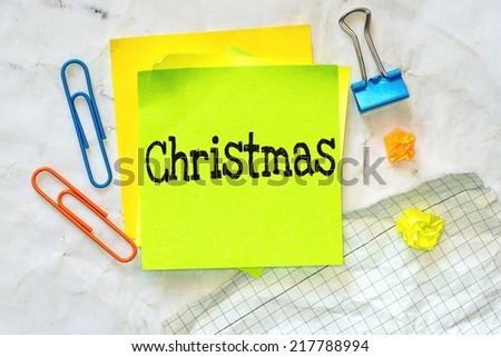 Crumpled paper texture with Text Christmas on the short note