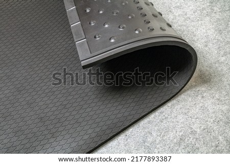 Hygienic rubber animal bedding mat for breeding animals. Horse Stall and Animal Hemp Bedding. Resting mats for animals of dairy cattle. Royalty-Free Stock Photo #2177893387