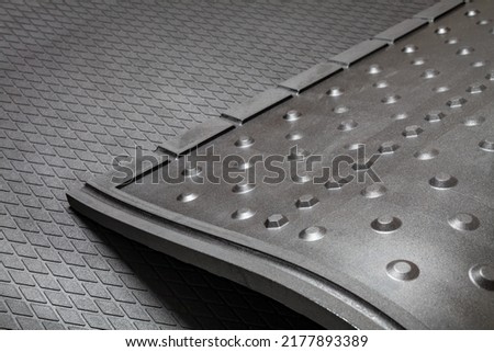 Hygienic rubber animal bedding mat for breeding animals. Horse Stall and Animal Hemp Bedding. Resting mats for animals of dairy cattle. Royalty-Free Stock Photo #2177893389