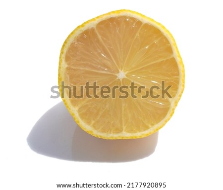 Close-Up Of Lemon Against White Background stock photo