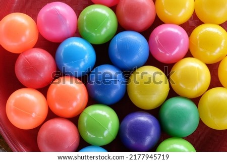 Colorful plastic balls are usually used for playing