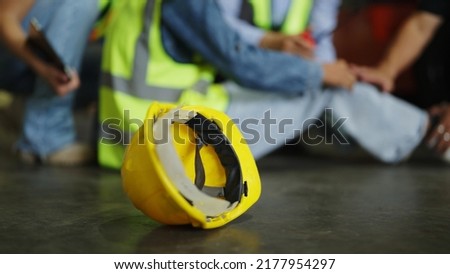 Factory Accident, Industrial accident. Warehouse staff having accident in the factory, industrial worker injured during working having pain on leg, worker helping and giving the injured first aid Royalty-Free Stock Photo #2177954297