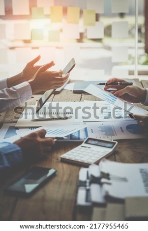 Financial analyst analysis business financial report on digital tablet during discussion at meeting of corporate showing the results of their successful teamwork, business meeting concept, Marketing
 Royalty-Free Stock Photo #2177955465
