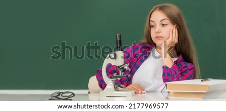 study biology, chemistry laboratory. research education. future scientist kid with scope. Banner of schoolgirl student. School child pupil portrait with copy space. Royalty-Free Stock Photo #2177969577