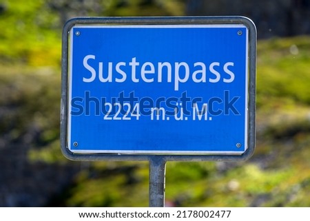 Road sign at Swiss mountain pass Susten 2224 Meters above sea level on a sunny summer day. Photo taken July 13th, 2022, Susten Pass, Switzerland.