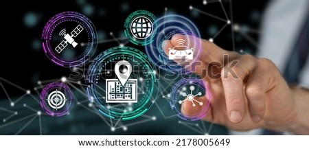 Man touching a gps concept on a touch screen with his finger