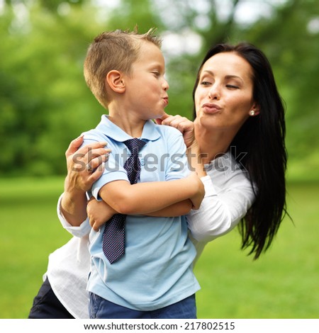 mom and son spending time together at park