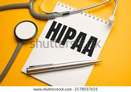 Page with HIPAA The Health Insurance Portability and Accountability Act of 1996 on the table with stethoscope, medical concept