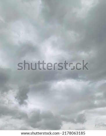 Gray stratocumulus clouds rise into the sky very windy Heavy rain at Thailand. no focus