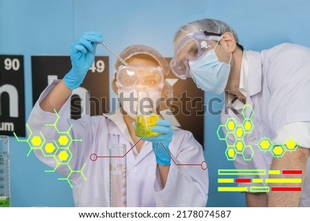 Man and Girl working with icon chemical in the laboratory.