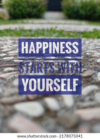 qoutes : happiness starts with yourself in blur background 