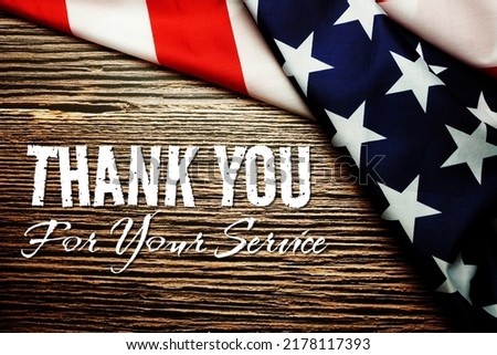 Thank You for your service text message and USA flag. American holiday background