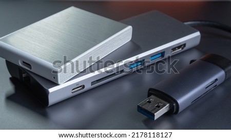 External ssd Harddisk and Reader Card,Converter Hub,on space gray color background.
