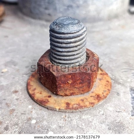 Rusty old pole mounting screws. Royalty-Free Stock Photo #2178137679
