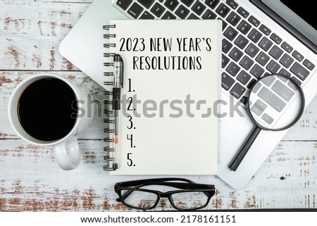 2023 New Year's Resolutions Text on Note Pad