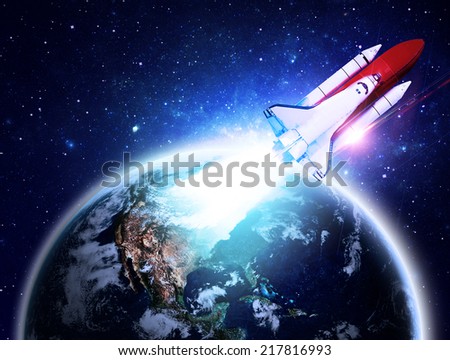 Rocket Blasting Off From Earth - Elements of this Image Furnished By NASA