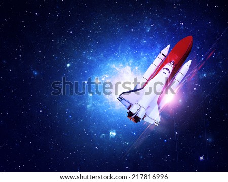 Rocket Flying Through Blue Starfield - Elements of this Image Furnished By NASA
