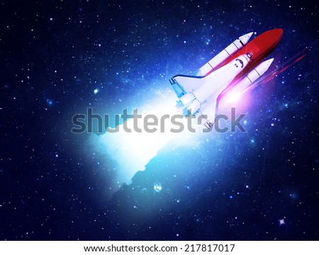 Rocket Blasting Through Starfield - Elements of this Image Furnished By NASA