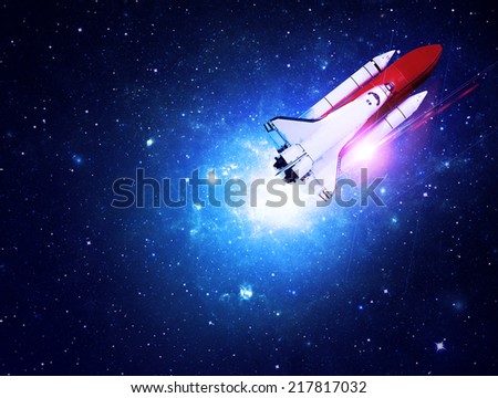 Rocket Flying through Starfield - Elements of this Image Furnished By NASA