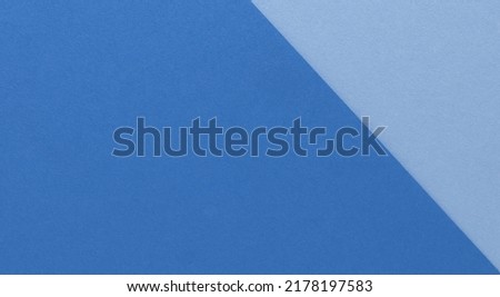 Two tone banner in blue tones. Paper texture background with blank space. Royalty-Free Stock Photo #2178197583