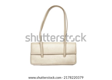 Beige ladies bag isolated on white background.