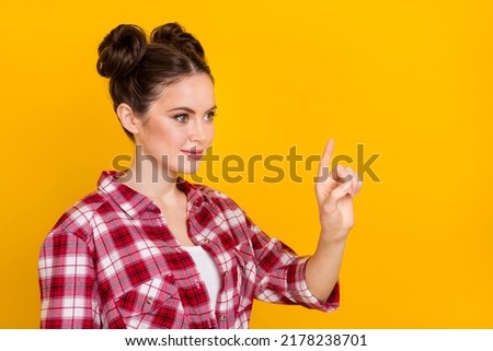 Photo of girlish lady using contemporary app touch imaginary screen hand isolated shine color background