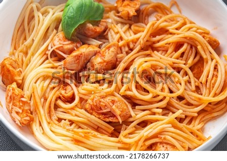 spaghetti pasta chicken tomato sauce fresh healthy meal food snack diet on the table copy space food background rustic top view