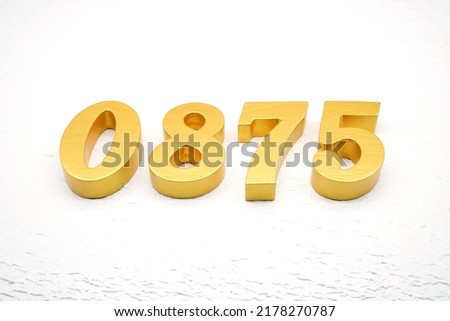      Number 0875 is made of gold painted teak, 1 cm thick, laid on a white painted aerated brick floor, visualized in 3D.                                