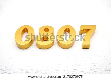    Number 0807 is made of gold painted teak, 1 cm thick, laid on a white painted aerated brick floor, visualized in 3D.                               