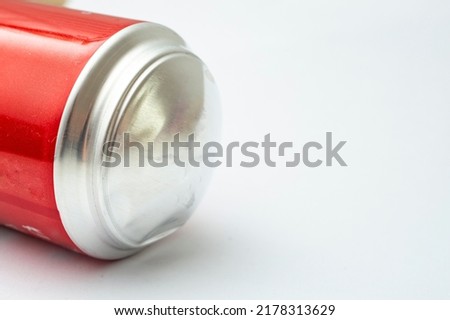 Bulging soda can bottom, isolated on white background, close up Royalty-Free Stock Photo #2178313629